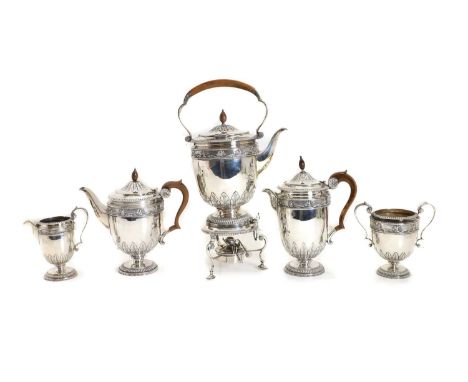 A silver tea silver service, by Mappin &amp; Webb, Sheffield 1917, comprising a large kettle and spirit stand, 40cm, a teapot