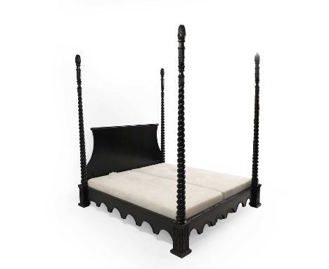 A 'Venetian' four poster bed by And So To Bed 20th century, of ebonised hardwood, with twisted supports and scalloped aprons,