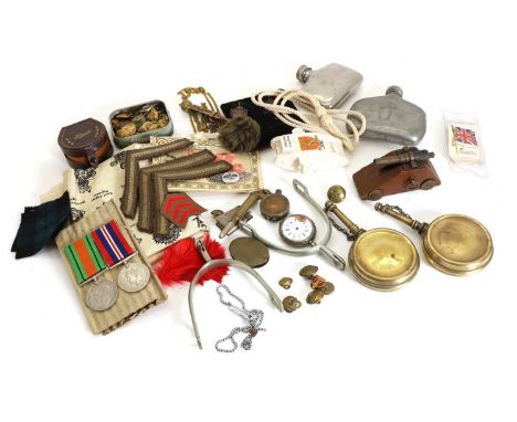 Various militaria items, to include a cased British army dividing compass, a World War I tank model miniature, a collection o