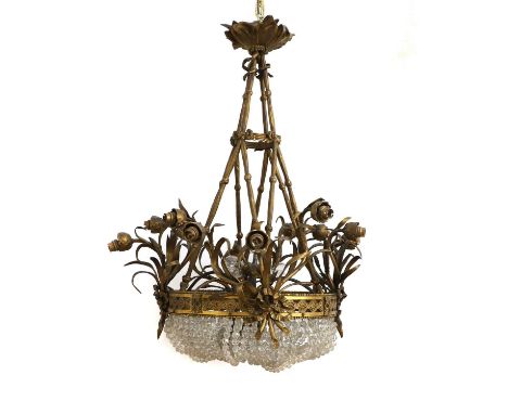 A gilt bronze and cut glass twelve light basket chandelier, Empire design, the crown is connected to the body by long stems w