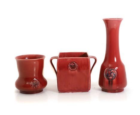 A Moorcroft red 'Flamminian' twin handled pot, for Liberty and Co, with impressed design to the front, 18cm wide13cm hightoge