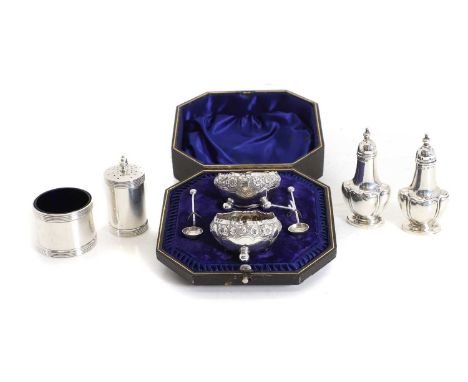 A Victorian silver cased pair of silver salts,  by Roberts & Belk, Sheffield 1895, with cast flowerhead detail on ball feet, 
