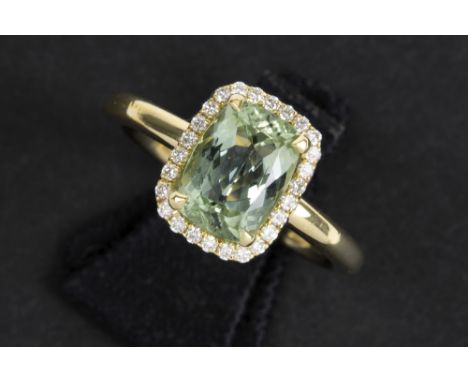 ring in yellow gold (18 carat) with a 2,35 carat natural cushion cut Tourmaline surrounded by 0,16 carat of very high quality