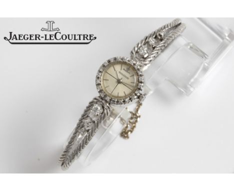 vintage Jaeger-LeCoultre marked mechanical ladies' wristwatch in white gold (18 carat) with diamonds and with a bracelet in w