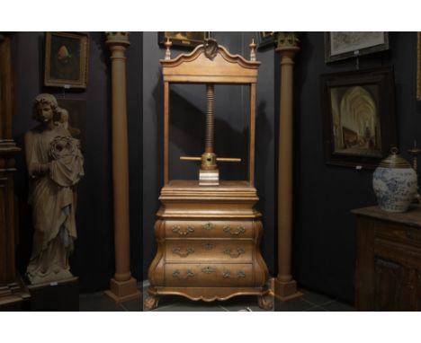 18th Cent. oak linen/book press with its chest with double curved front and three drawers &amp; with its top with a sculpted 