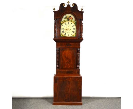 Mahogany longcase clock, the hood with swan neck pediment, brass finials, rope twist columns, trunk with short door and match