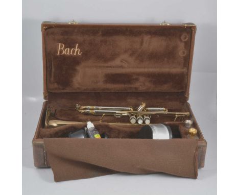 Stradivarius Model 25 trumpet, by Bach, Elkhart, IN, US, with additional mouthpieces, mufflers, in original Bach case.