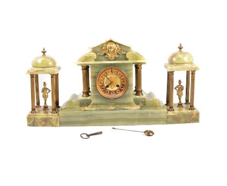 Onyx clock garniture, clock or architectural form, circular dial, French cylinder movement striking on a gong, 32cm, together