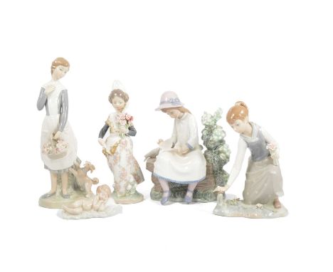 Collection of Lladro, Nao, and other continental figurines.Qty: 15