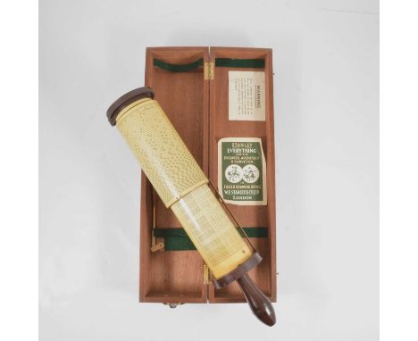 A mahogany cased Stanley "Fuller Calculator", with brown bakelite mounts and handle, with brass indicator, numbered cylinder,