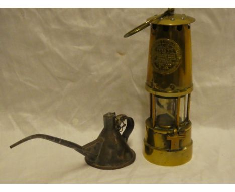 An all brass miner's Davy lamp by the Protector Lamp and Lighting Company together with a long spout lamp filler (2)