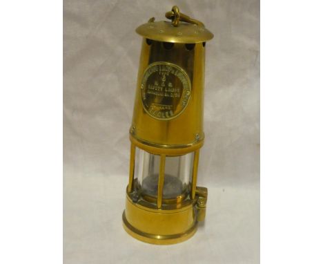 An all brass miner's lamp by The Protector Lamp and Lighting Co of Eccles