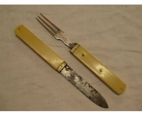 An old military officer's interlocking campaign knife and fork by Bonsa with ivorine handles