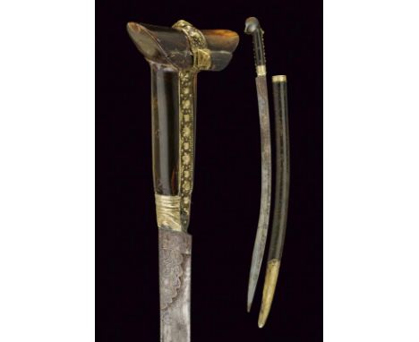 dating: Mid 19th Century provenance: Turkey, Curved, single-edged blade with 'T' back, featuring a double decoration with a s