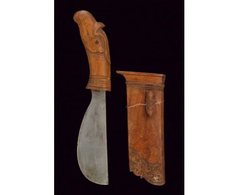 dating: circa 1900 provenance: Giava, Heavy, single-edged blade, strongly curved and convex, straight back. Wooden grip, chis