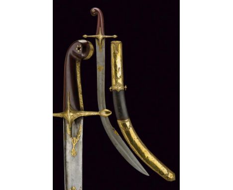 dating: Early 19th Century provenance: Turkey, Large, curved, single-and false-edged blade, in fine damask, with 'T'-back and
