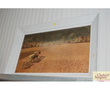 A large framed print depicting a farming scene 