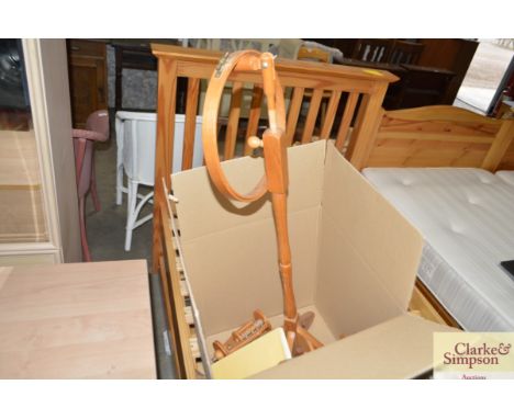 A box containing a tapestry frame etc