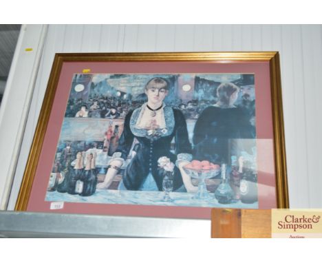 A framed Monet print 'Bar at Folies Bergere'