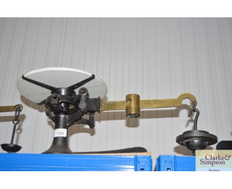 A set of Fairbanks US cast iron and brass counter scaleswith ceramic platform AF