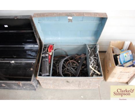A tin trunk and contents of various horse tack
