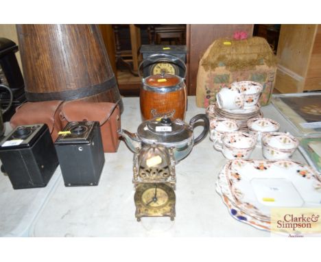 An oak biscuit barrel AF together with a slate cased mantle clock; brass cased time piece etc