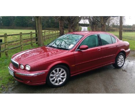 A Jaguar X type V6 SE auto
Registration MV52 TUA, odometer reading 77,801 miles.  A metallic red four door saloon with a 2.5 