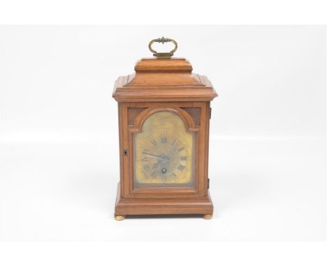 A late 19th century mahogany cased bracket clock
With an arched brass dial signed Jno Ronning Newmarket with Roman and Arabic