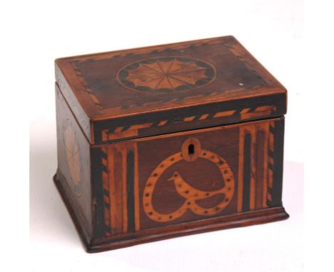 An 18th Century mahogany and marquetry inlaid tea caddy
The rectangular hinged cover inlaid with an open satinwood fan enclos