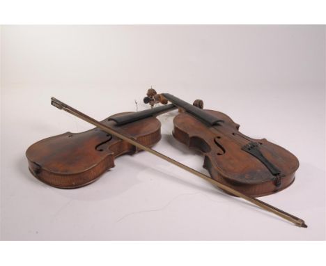 A violin with a printed label Giovan Paolo Magginibrele
60cms, cracked, and another violin bears a label Antonius Stradivariu