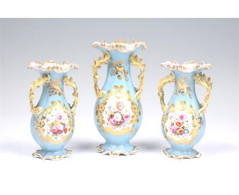 A garniture of three Chamberlerlain's Worcester vases,
Rococco design each of waisted baluster form painted with panels of En