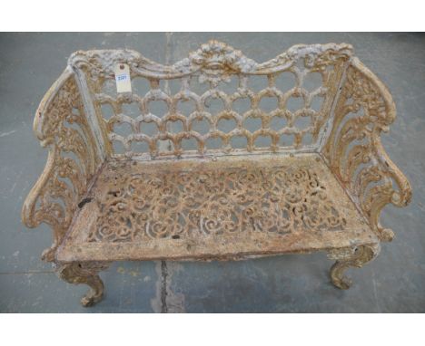 A Substantial cast iron garden bench 20th Century
With leaf and interlaced back and down swept scrolling arms, interlaced lea