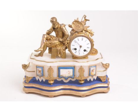 A gilt spelter alabaster and porcelain mantle clock, late 19th Century
With a 8cm white dial with Roman numerals the two trai