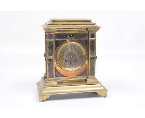 A Victorian brass variegated marble and hardstone mantle clock
With a 9cm dial with Roman numerals, the two train Jappy Frere