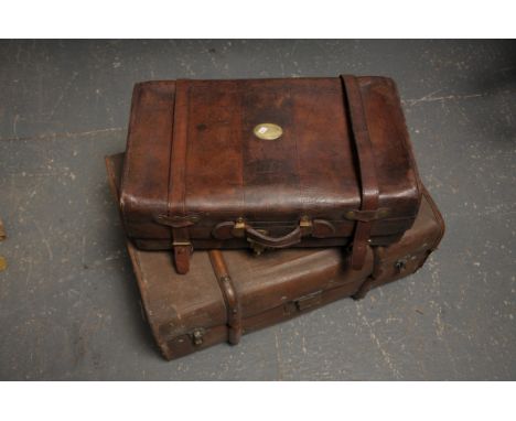 A good leather and brass embellished suitcase by J W Allen, 57 Strand, London 1862
The rectangular hinged top with a brass in