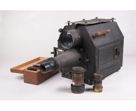 An early 20th Century Ross London, tin plate projector
With a Ross number 130261 magnifier 10cms, of upright rectangular form