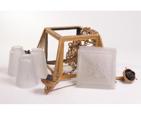 A Victorian gilt metal Art Deco hanging lantern
Of upright rectangular form with outset fan shape angles and light fittings, 