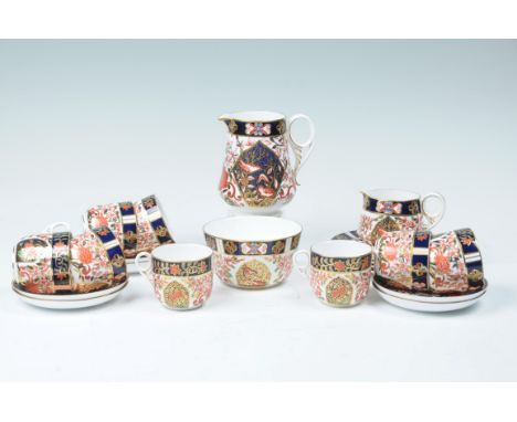 A Royal Crown Derby tea service
1902 and later, comprising milk jug, 14cms, cream jug, eight cups, six saucers, four 15.5cm s