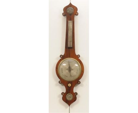 A George IV rosewood and mother of pearl inlaid wheel barometer
With a 20cm silver dial above a hygrometer, thermometer, lack