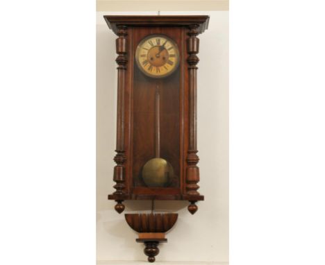 A Victorian walnut veneered and beech wood Vienna style wall clock, late 19th Century
With a 18cm dial with Roman numerals th