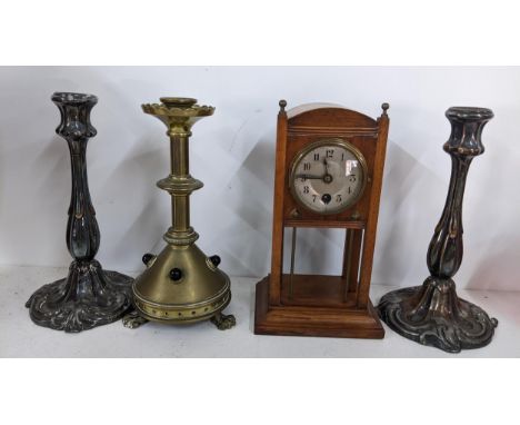 A mixed lot to include an early 20th century Junghans clock, gilt candlestick inset with red cabochons and a pair of silver p