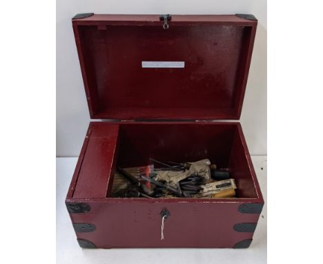 A collection of vintage tools contained in a red painted twin handled chestLocation:If there is no condition report shown, pl