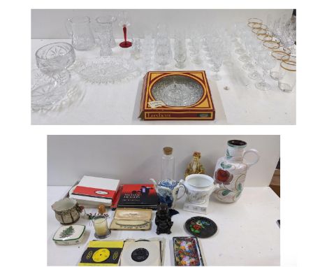 A mixed lot to include a collection of crystal cut glassware to include brandy glasses, sherry glasses, trays, vases and othe