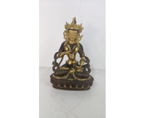 A late 20th century Nepalese bronze and gilt metal painted Vajrsattva dorje Sempa statue that has been consecrated, 21cm h Lo