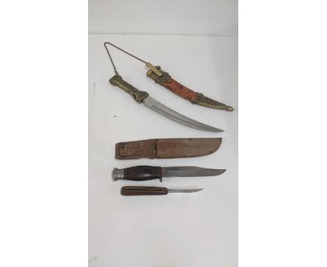 A Milbro Kamp Bowie knife Sheffield, having a wooden handle, brass spacers a lunnum Pomel and Brass guard, along with a touri