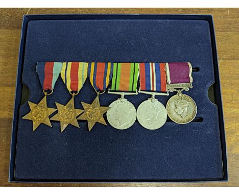 Medals to include Burma Star, The Africa Star, The 1939-1945 Star, The Defence Medal, The Victory Medal, and a Regular Army M