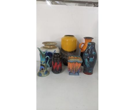 Mixed ceramic vases to include a Poole pottery example, signed to the base, an Art Deco Wad heart vase and other itemsLocatio