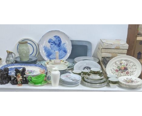 A mixed lot of ceramics and pottery items to include a pair of bookends fashioned as boys, a W Goeble figure of a girl kissin