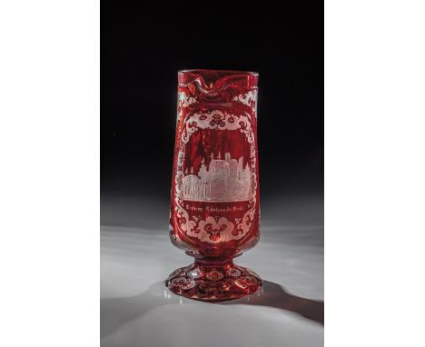 Henkelkrug mit Ansicht von Baden-Baden Boehmen, Mitte 19. Jh. Rot lasierter Henkelkrug mit Ansicht von Baden-Baden bezeichnet