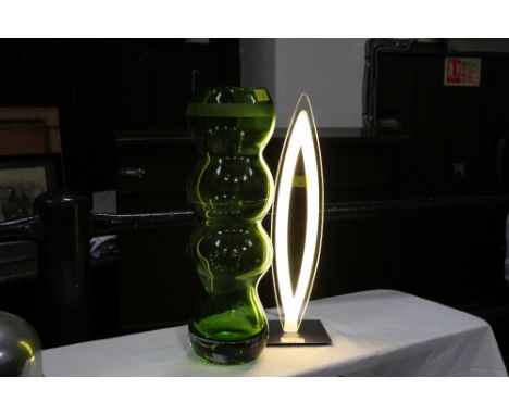 Glass lamp and green glass vase